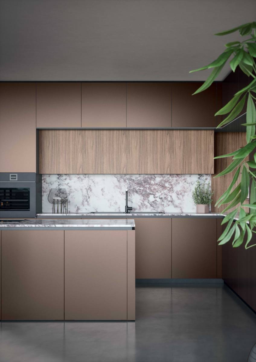 La technologie appliquée aux por tes Filo permet  de personnaliser les réalisations avec une liber té  ex traordinaire. Dans cet te composition, la por te  du meuble haut mesure 240 cm de long, avec à l' intérieur deux meubles hauts , une armoire de  rang