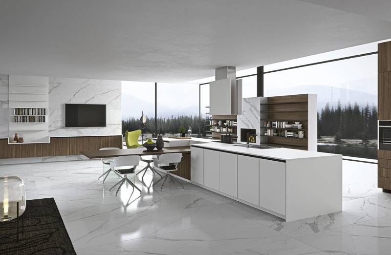 Le support de la table, en verre transparent, donne l'impression d'un plan de travail léger, presque suspendu dans le vide. Un materiau innovant qui trouve de plus en plus d'applications dans le domaine de la cuisine et dans l'ammeublement.